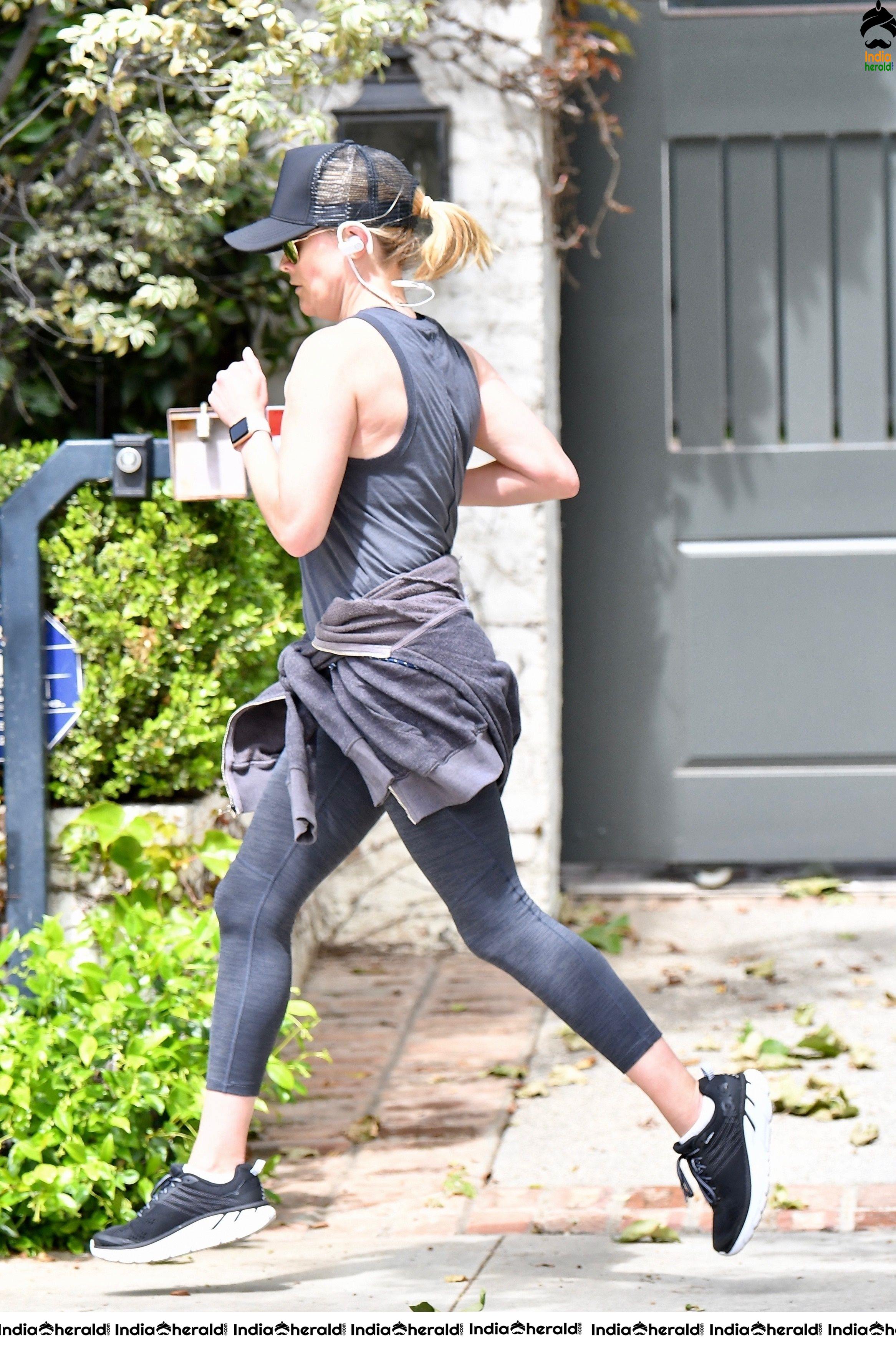 Reese Witherspoon caught by Paparazzi while jogging in Brentwood