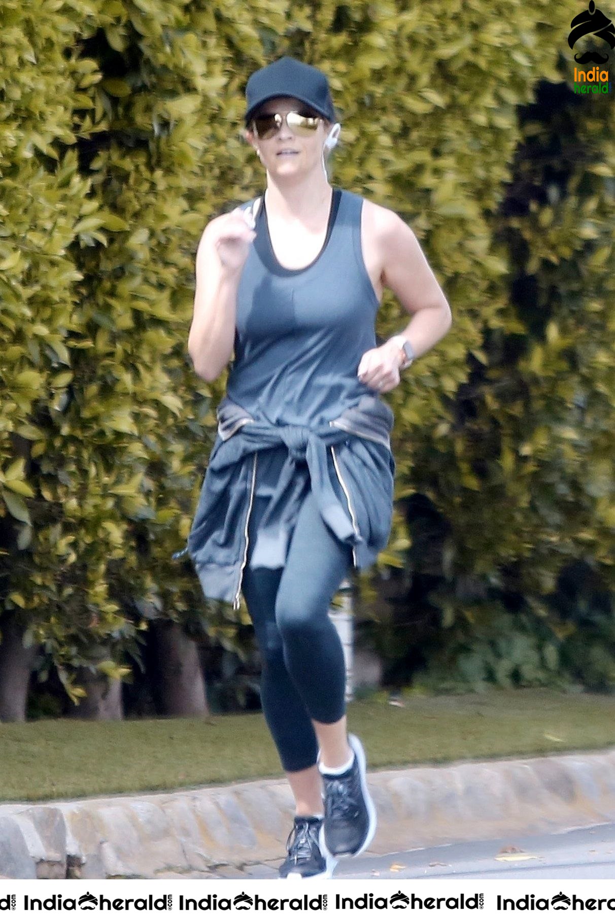 Reese Witherspoon caught by Paparazzi while jogging in Brentwood