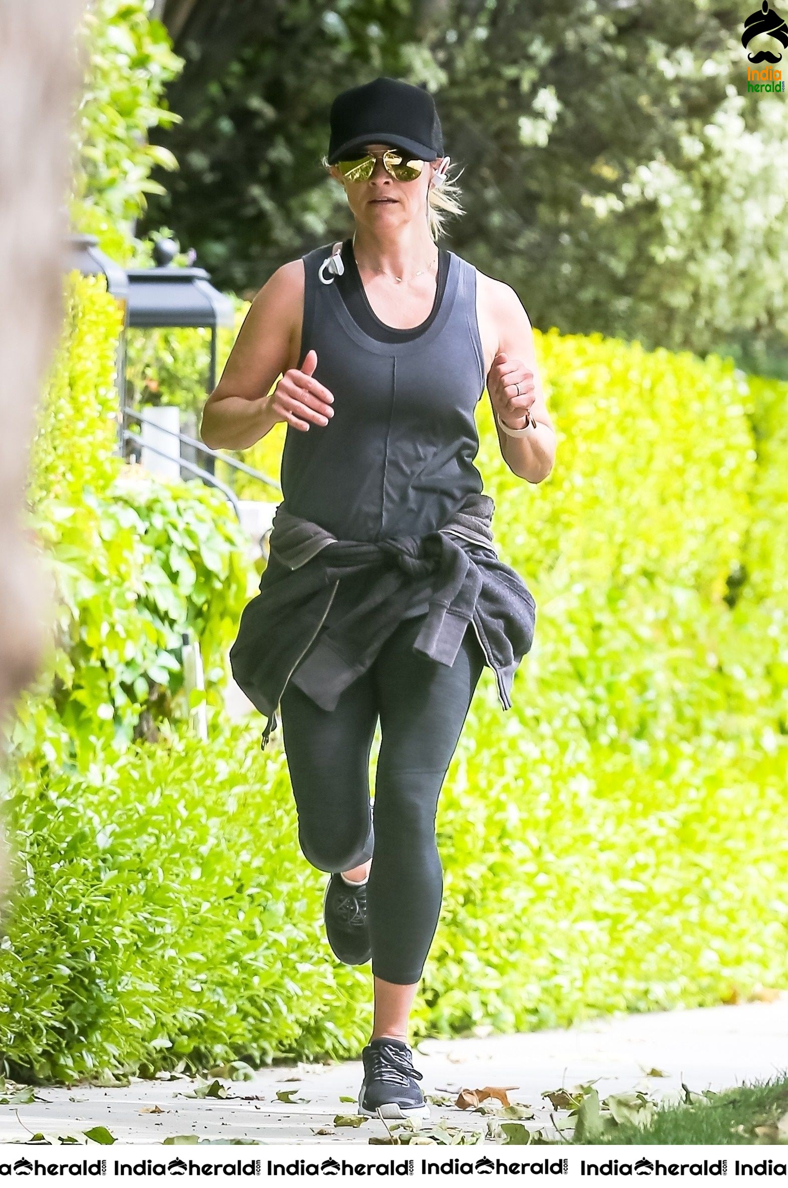 Reese Witherspoon caught by Paparazzi while jogging in Brentwood