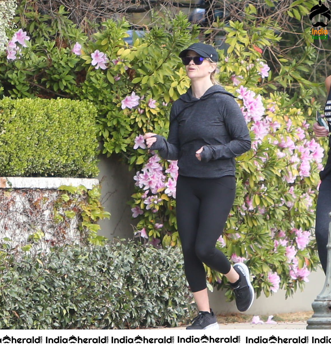 Reese Witherspoon seen jogging with a friend in Los Angeles