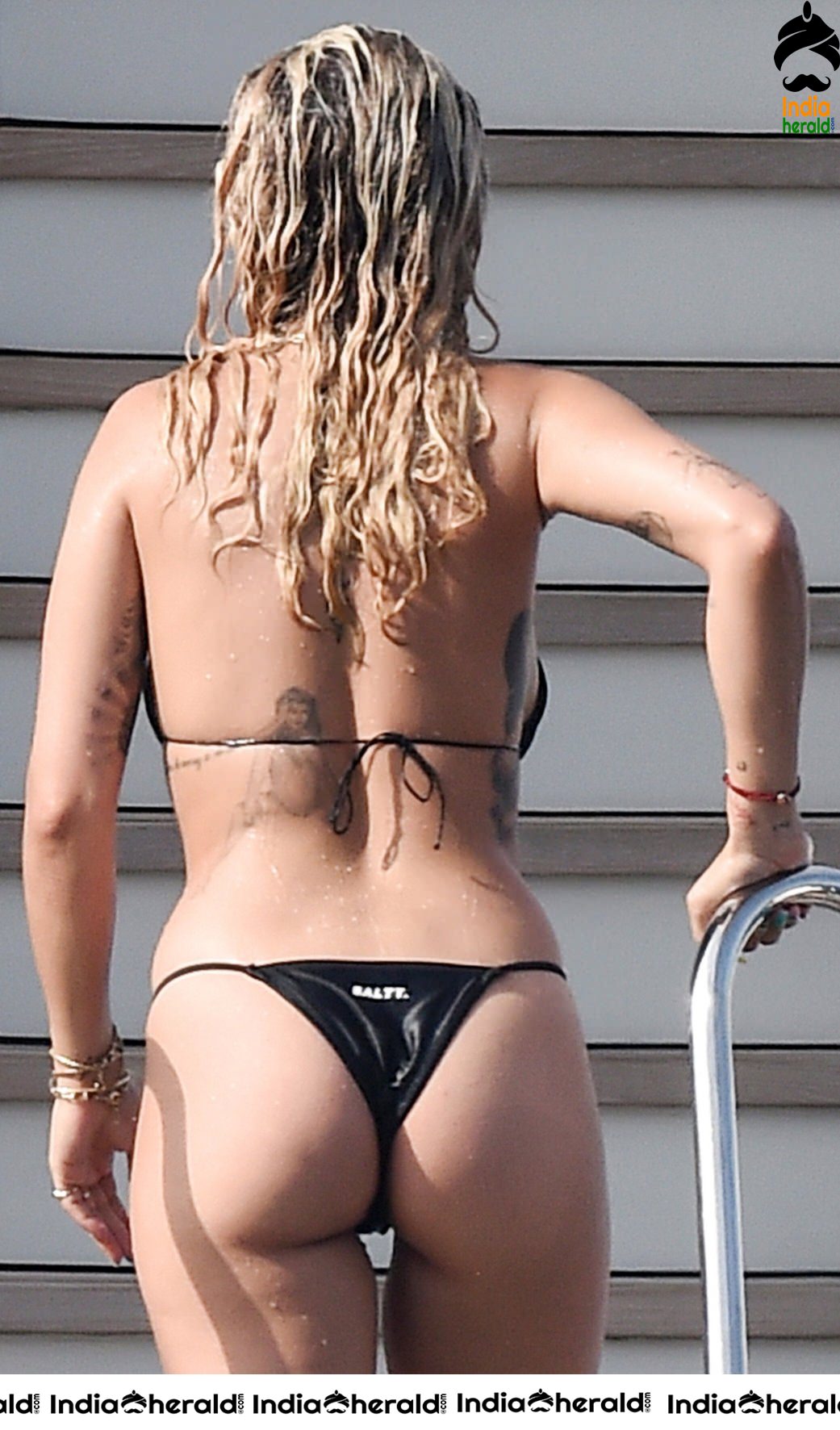 Rita Ora in Bikini enjoys at a Beach in Studio City