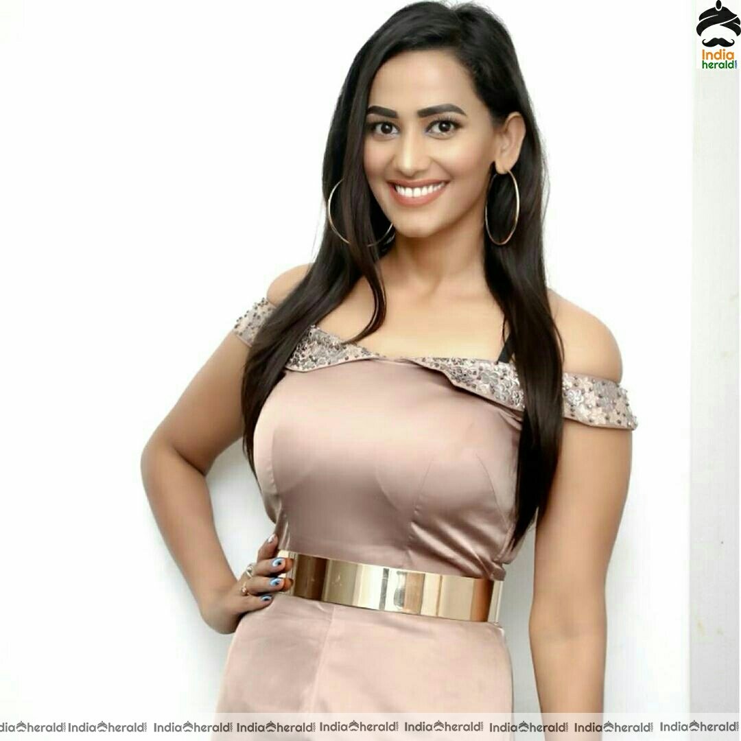 Sanjana Singh Latest Hot Golden Attire Stills