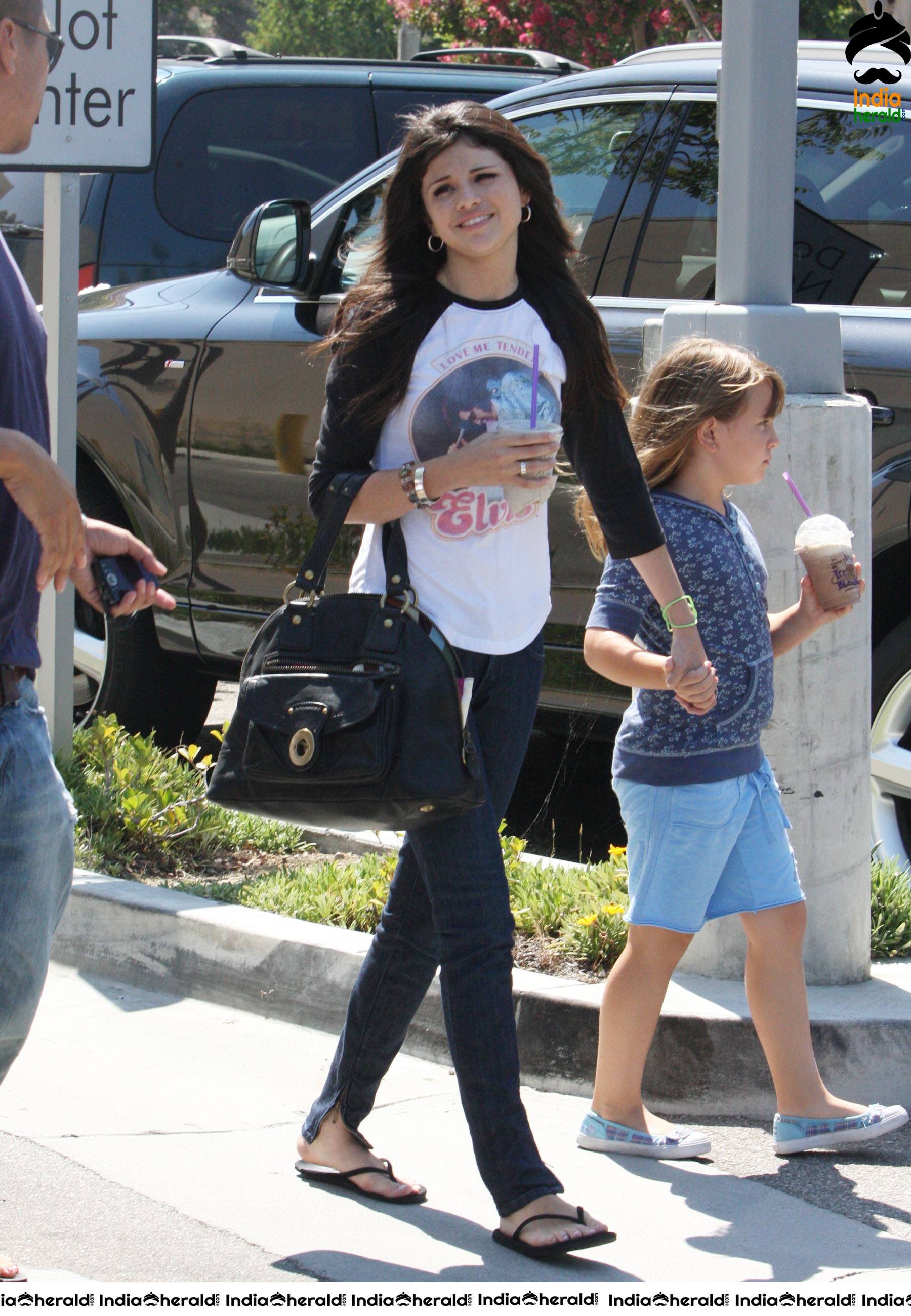 Selena Gomez caught by Paparazzi as she is seen in Coffee Bean shop at Toluca Lake