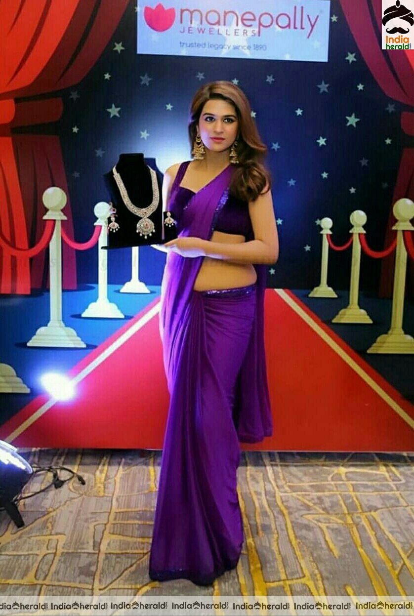 Shraddha Das Latest Tempting Purple Saree Stills