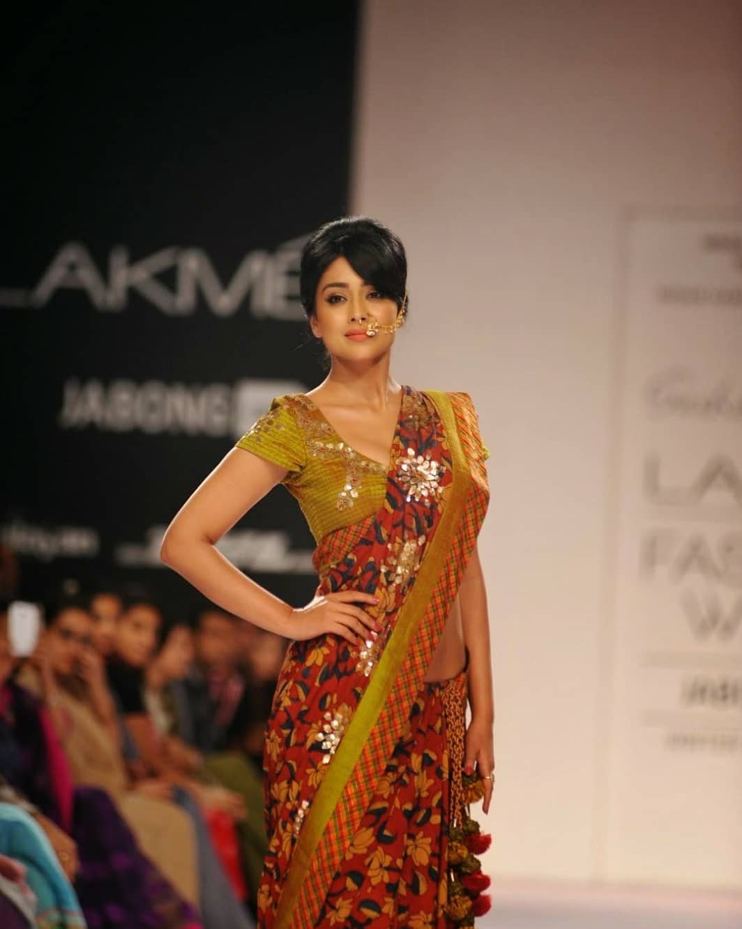 Shriya Saran Looks Super Sexy On The Ramp Wearing A Revealing Saree