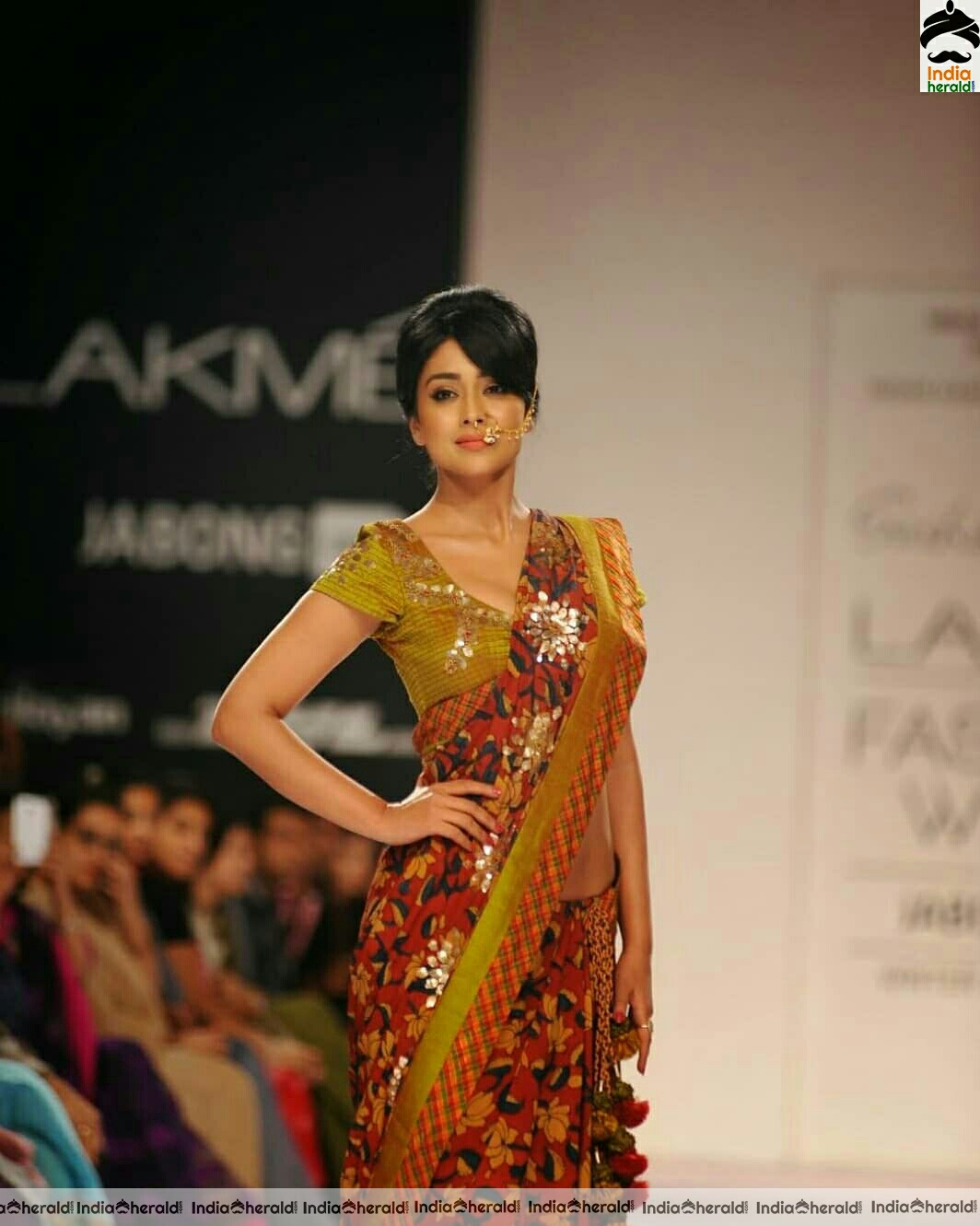 Shriya Saran walks the ramp in these photos