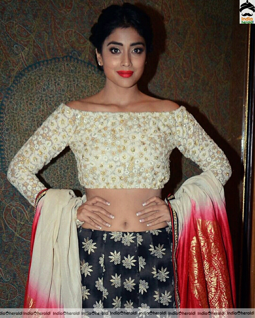 Shriya Shows Her Sexy Waist In Latest Golden Dress