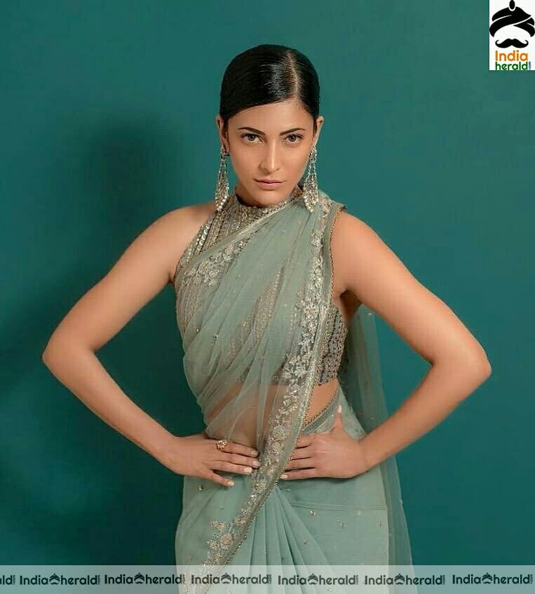 Shruti Hassan Hot In Green Net Saree Stills