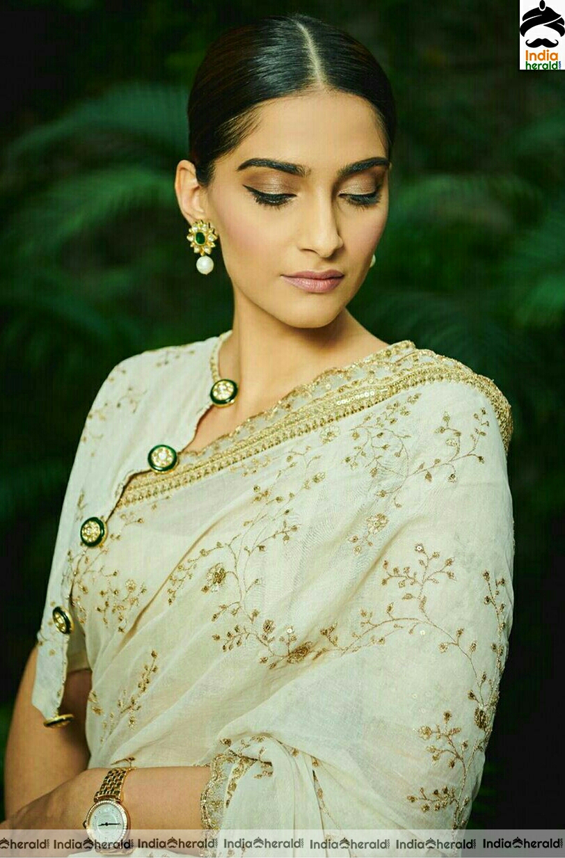 Sonam Kapoor Hot And Cute White Saree Stills