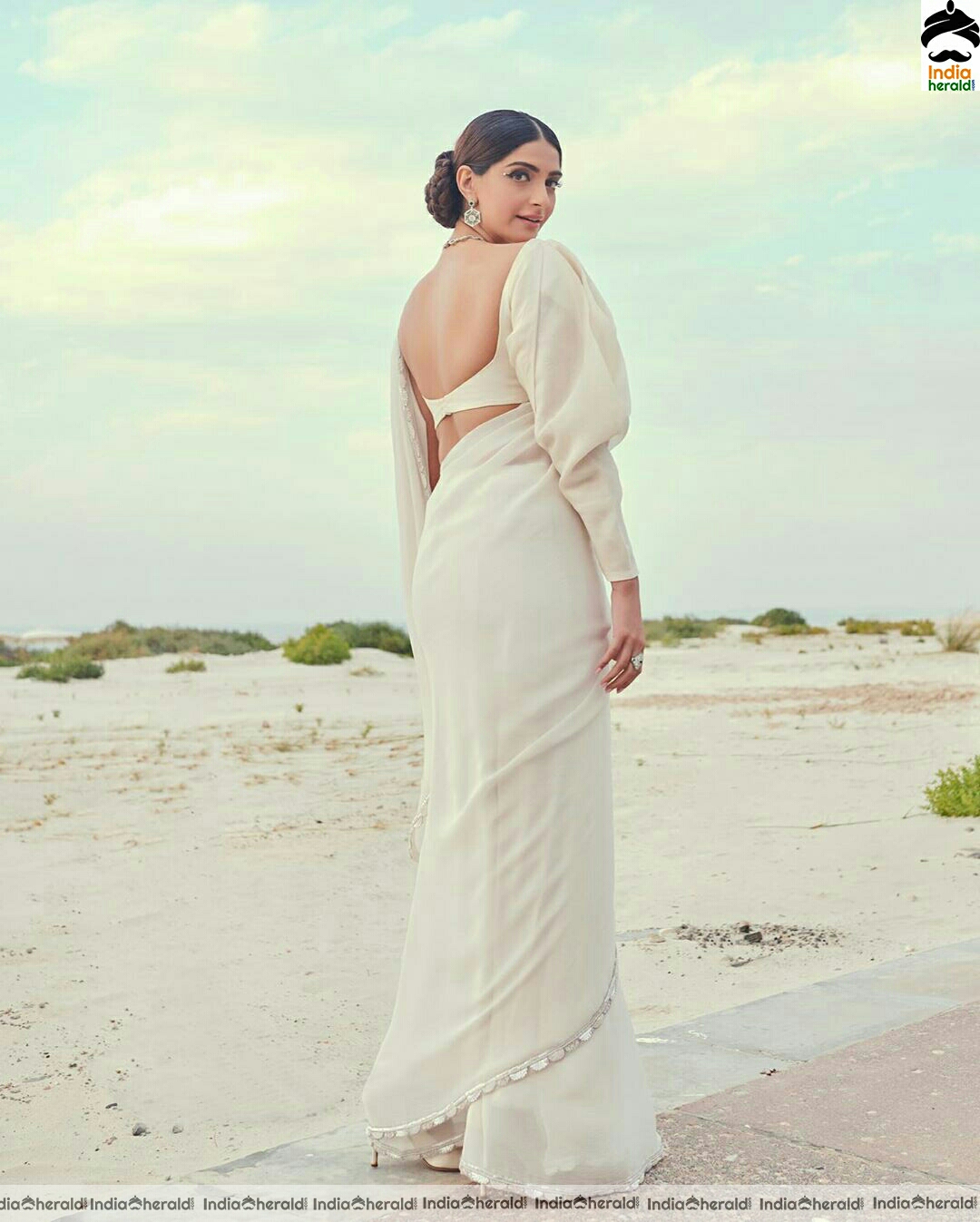 Sonam Kapoor Hot And Cute White Saree Stills