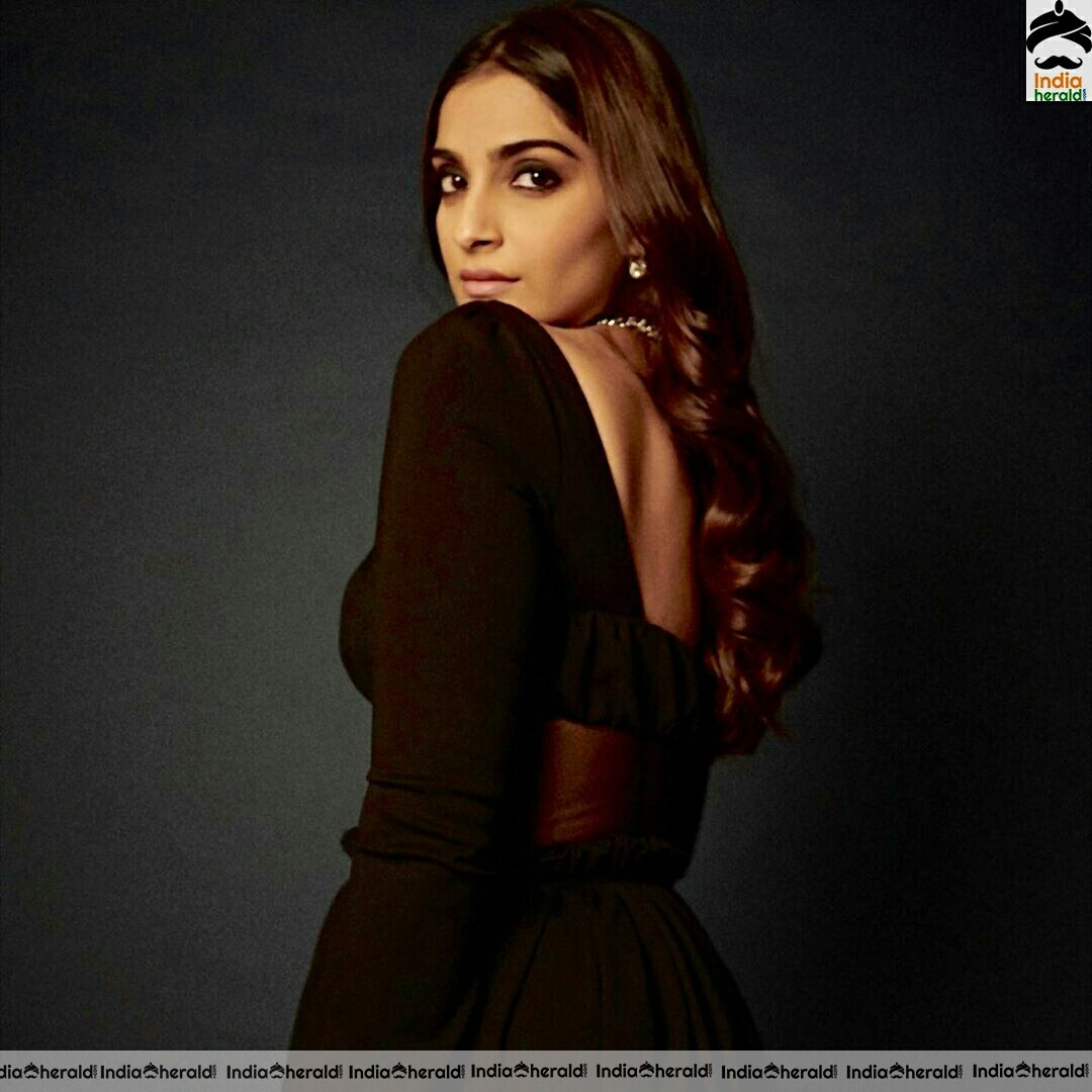 Sonam kapoor Hot Cleavage Stills In Black Dress