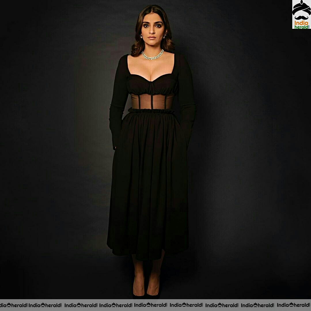 Sonam kapoor Hot Cleavage Stills In Black Dress
