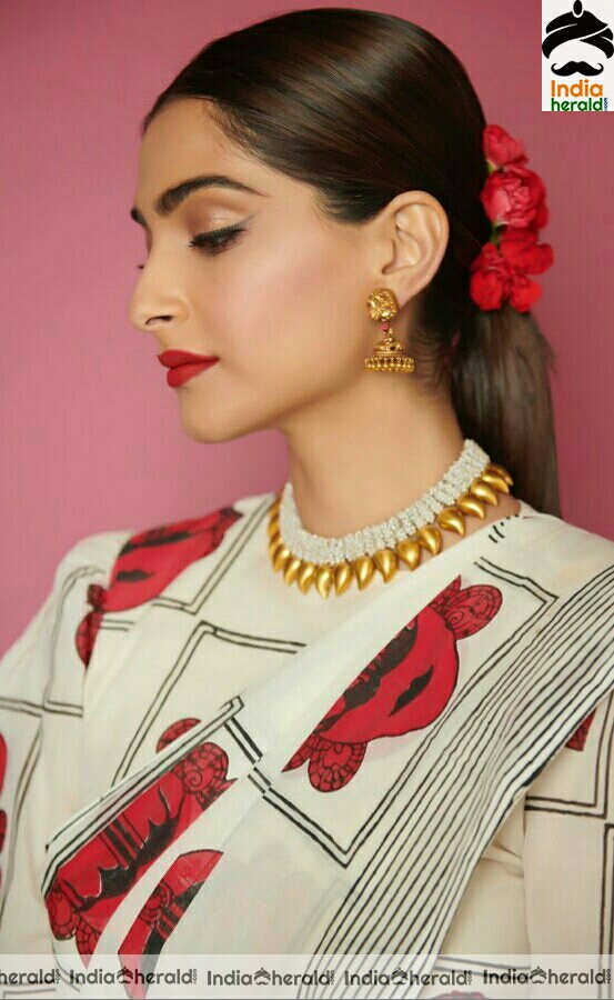 Sonam kapoor Latest White And Red Saree Stills