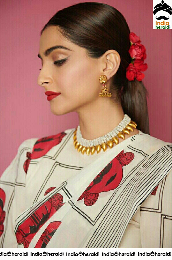 Sonam Kapoor Looking Beautiful In White And Red