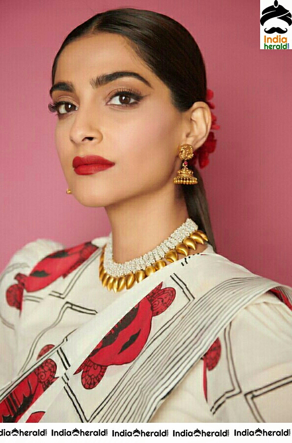 Sonam Kapoor Looking Beautiful In White And Red