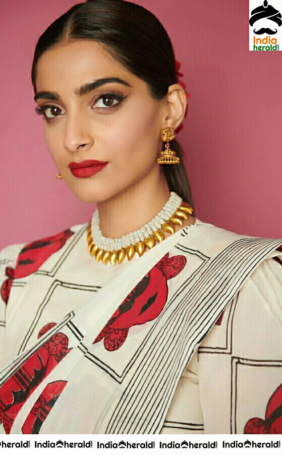 Sonam Kapoor Looking Beautiful In White And Red