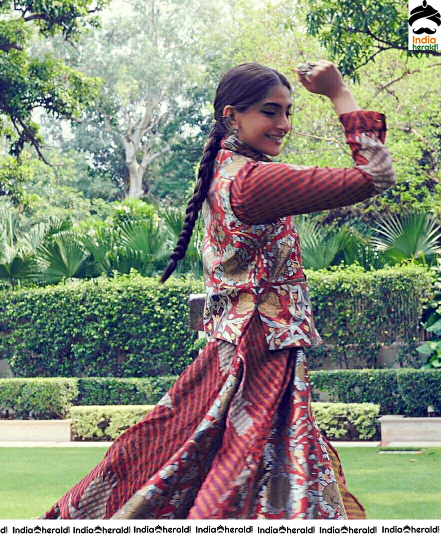 Sonam Kapoor Looks Cute In Traditional Maroon Dress