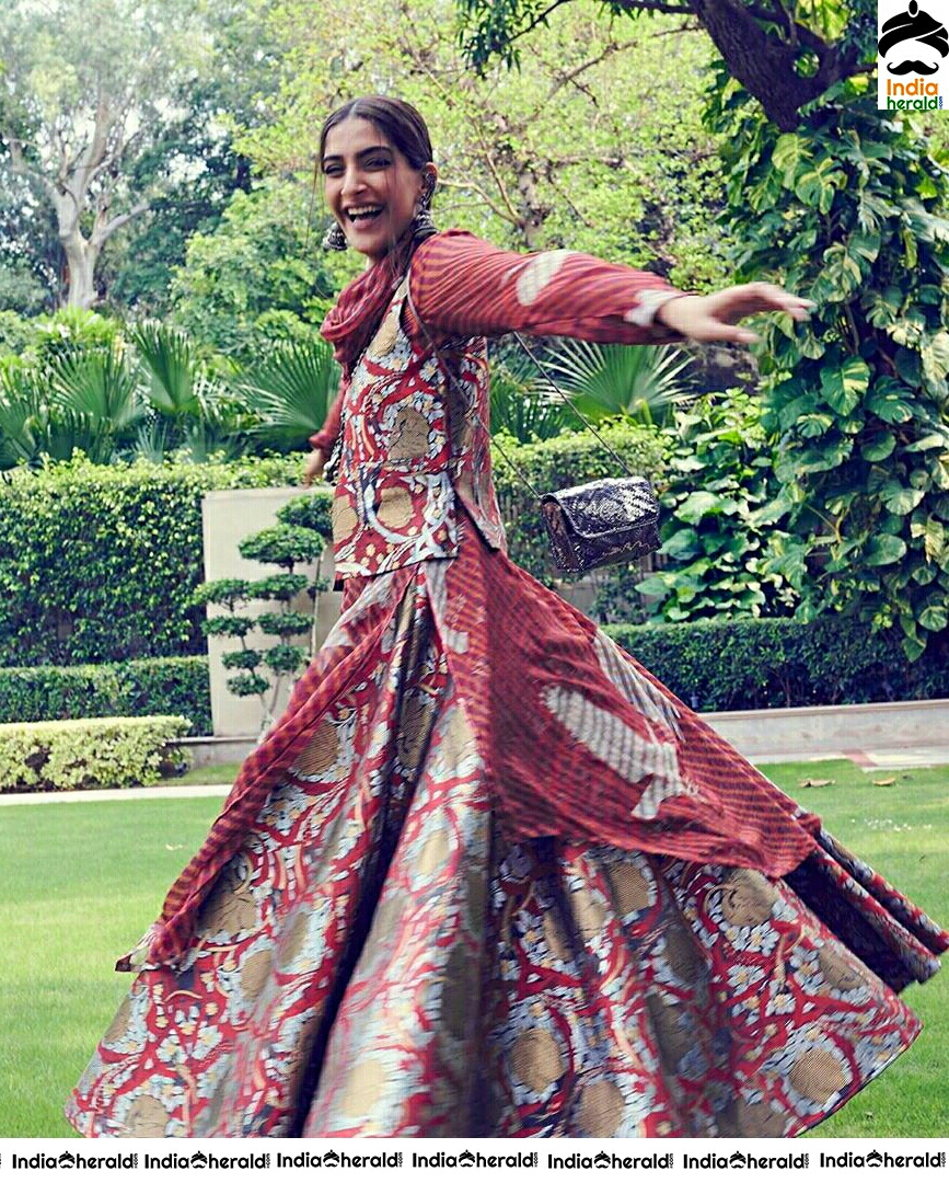 Sonam Kapoor Looks Cute In Traditional Maroon Dress