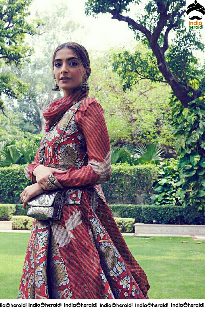 Sonam Kapoor Looks Cute In Traditional Maroon Dress