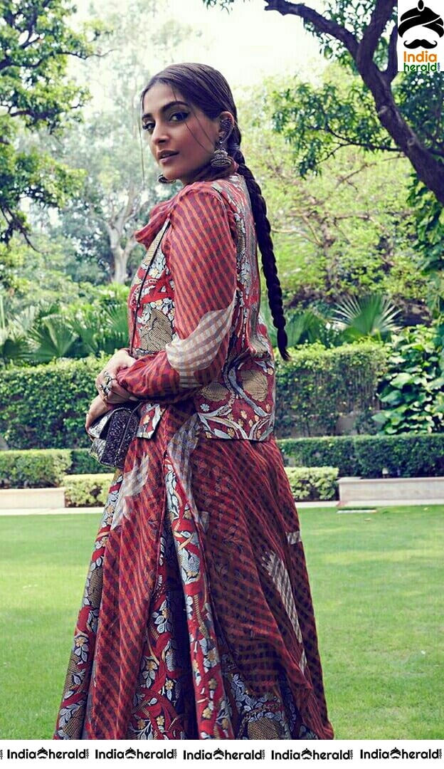 Sonam Kapoor Looks Cute In Traditional Maroon Dress