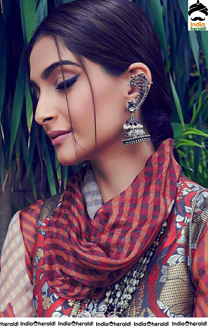 Sonam Kapoor Looks Cute In Traditional Maroon Dress