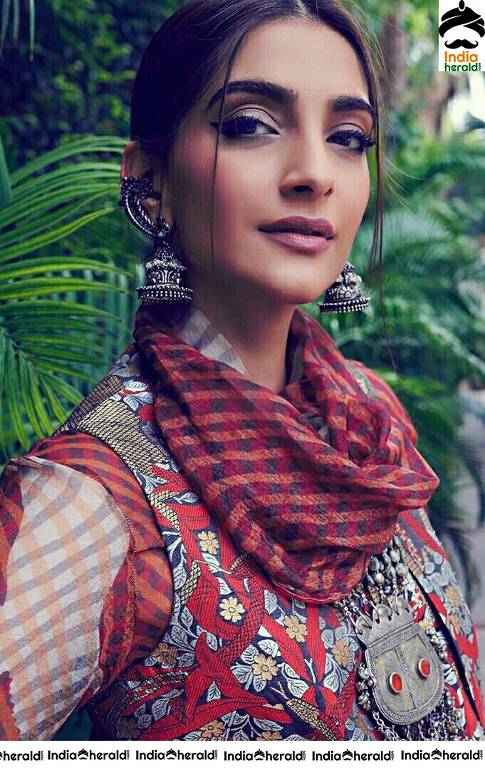 Sonam Kapoor Looks Cute In Traditional Maroon Dress