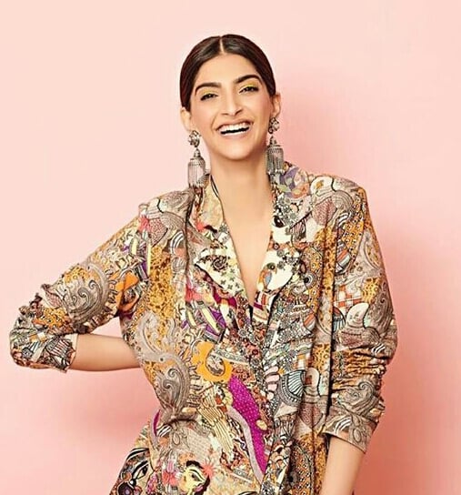 Sonam Kapoor Shows Her Sexy Back In Multicolour Dress