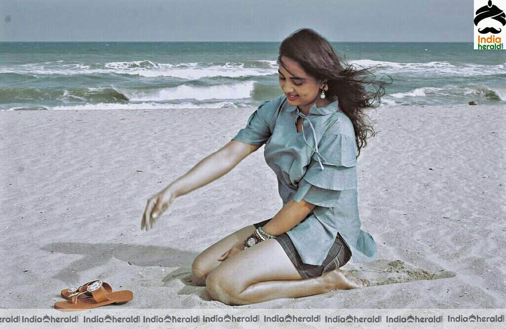 Srushti dange hot thigh show in beach photos