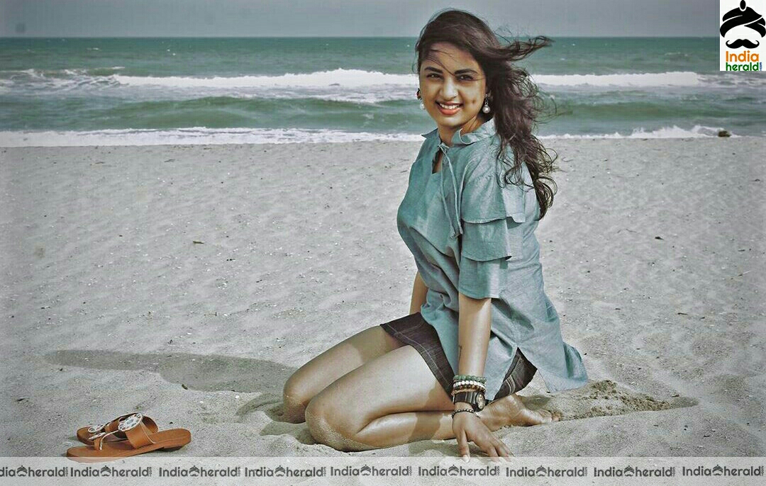 Srushti dange hot thigh show in beach photos