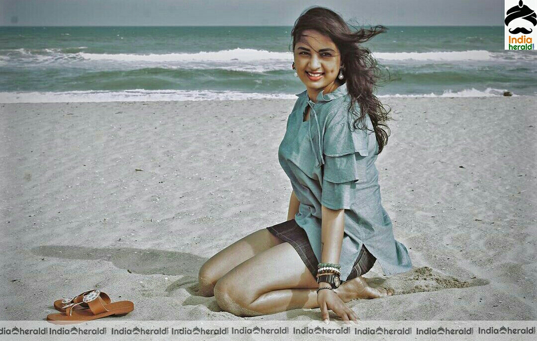 Srushti dange hot thigh show in beach photos