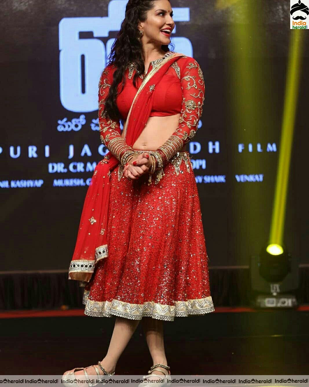 Sunny Leone Shows Her Hot Waist In Red Choli Stills