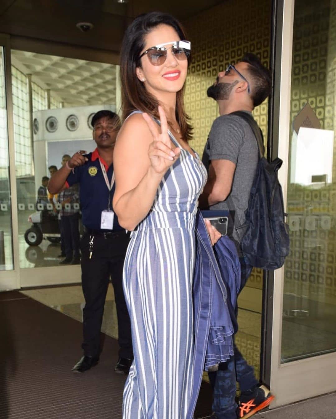 Sunny Leones Seen In A Jumpsuit At An Airport