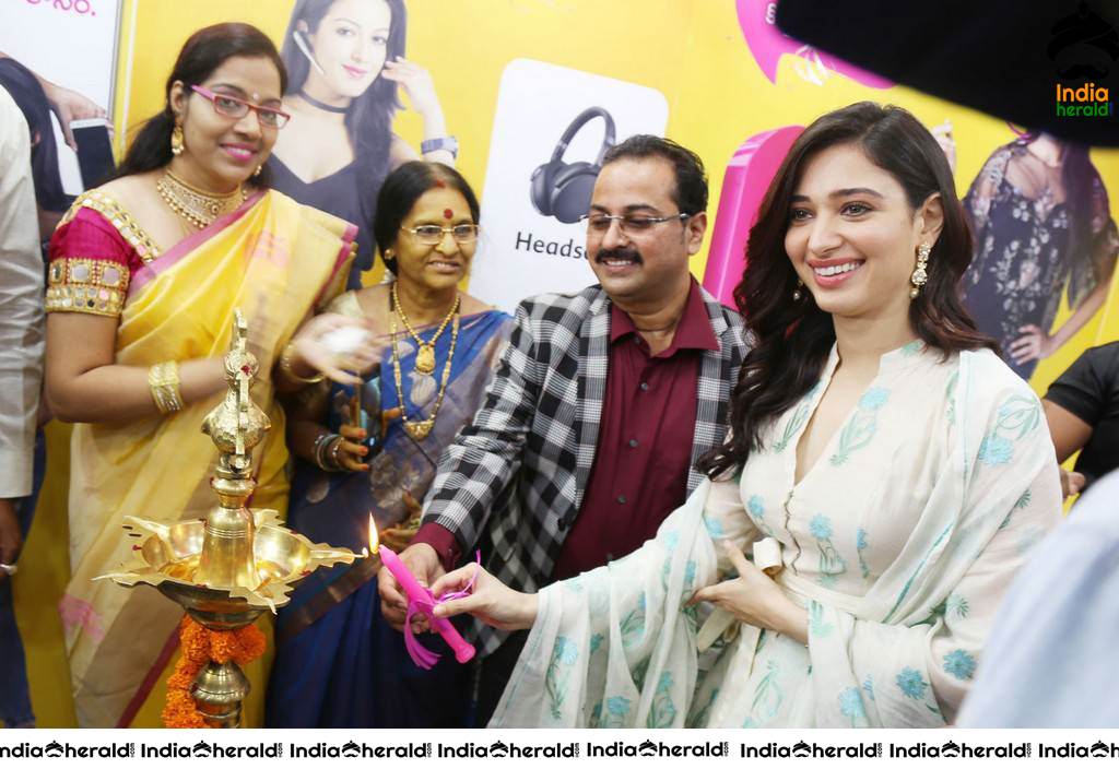 Tamannaah Looking Hot in White at Mobile Store Launch in Vijayanagaram