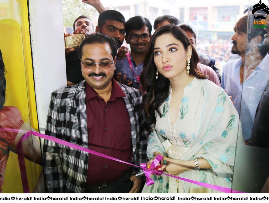 Tamannaah Looking Hot in White at Mobile Store Launch in Vijayanagaram