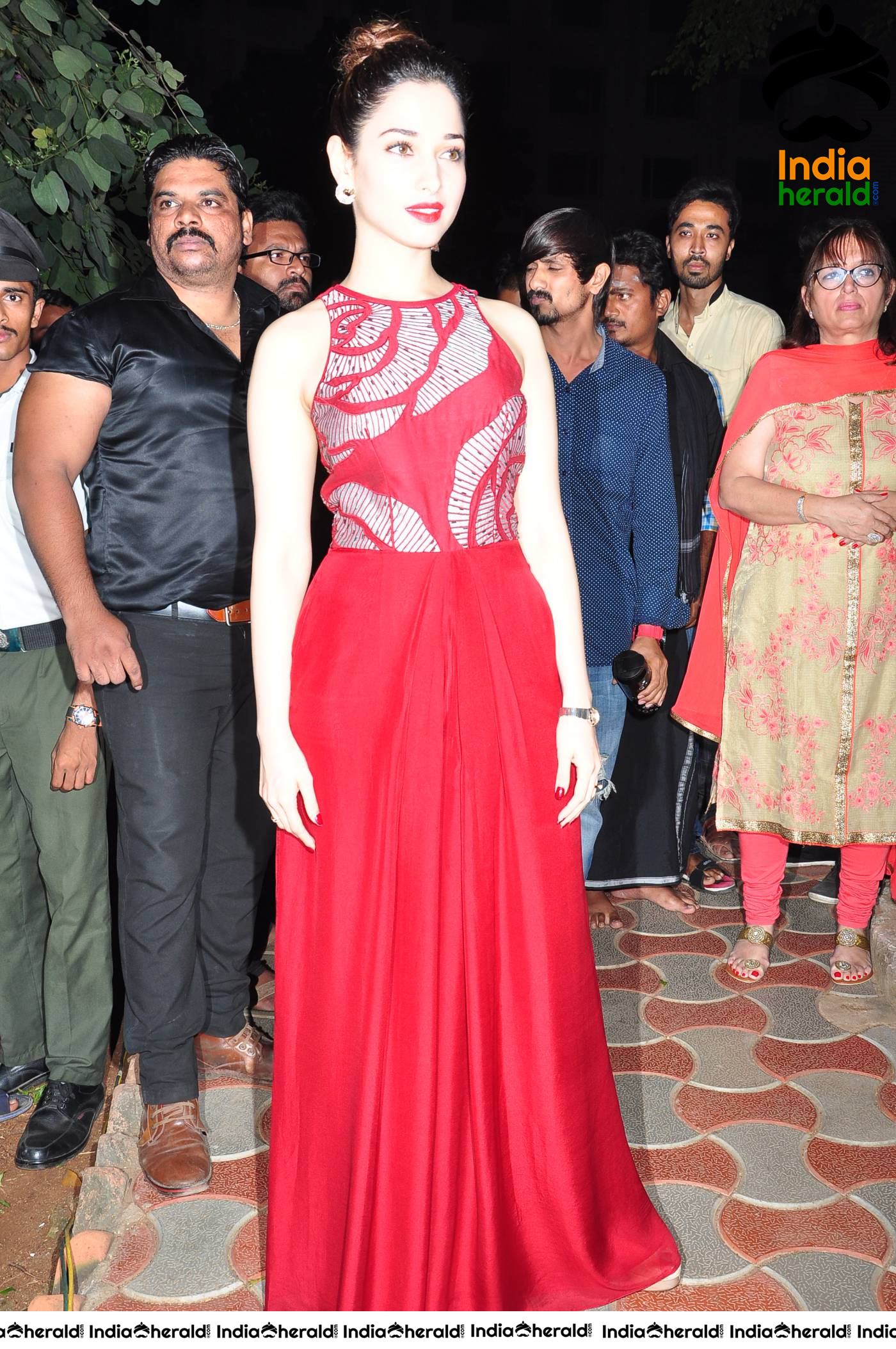 Tamannaah Red Hot In A Red Sleeveless Long Frock At A Recent Event Set 1