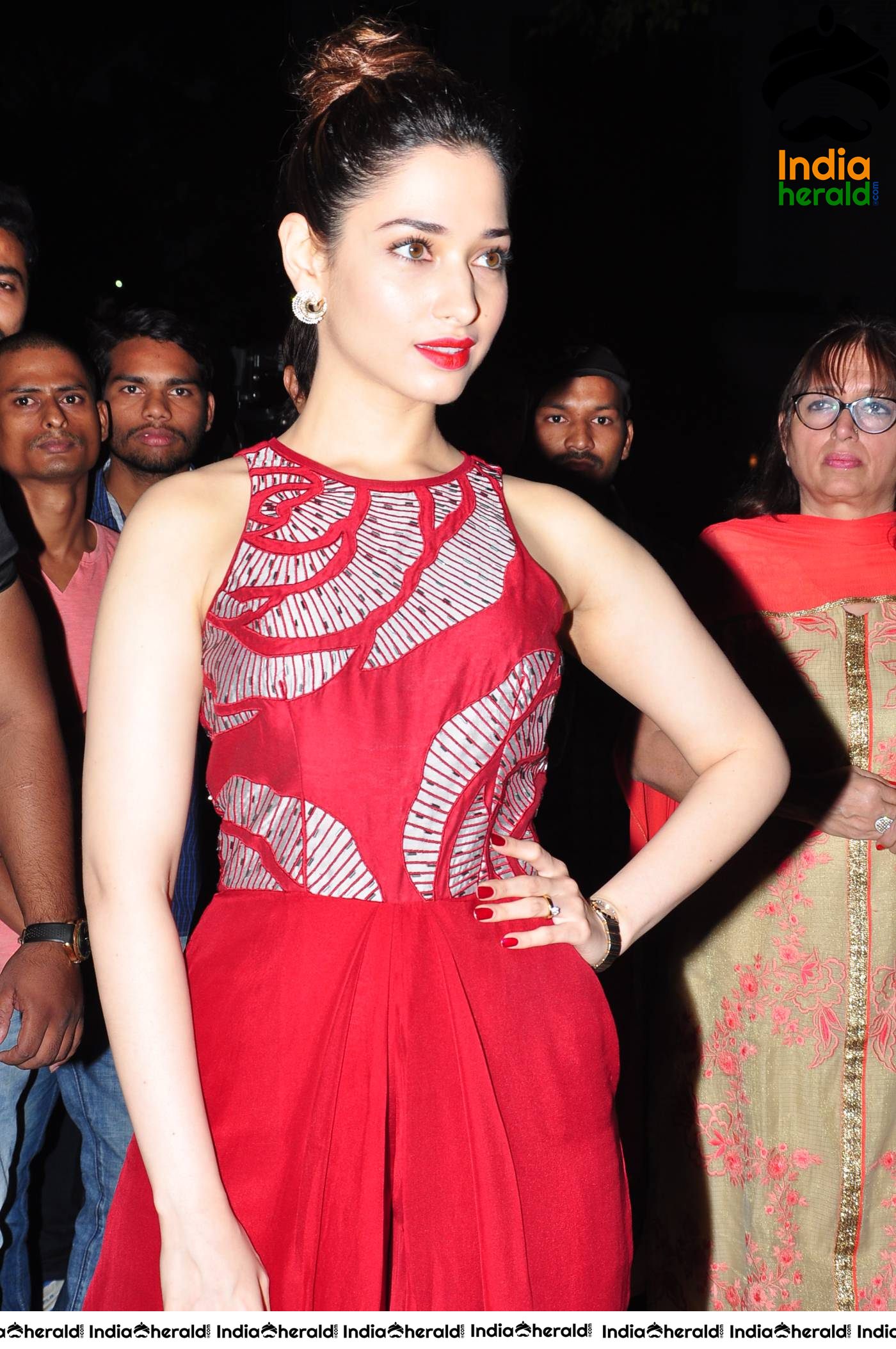 Tamannaah Red Hot In A Red Sleeveless Long Frock At A Recent Event Set 3