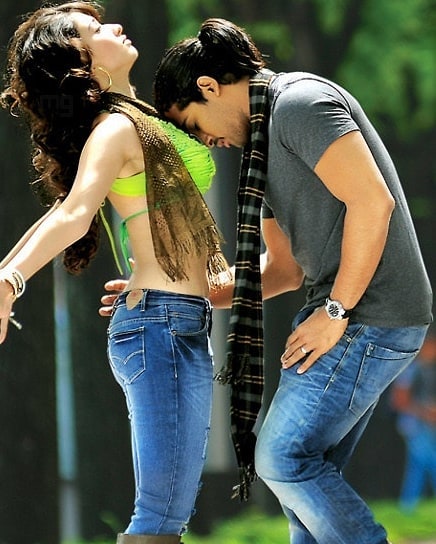 Tamannaah Shows Her Sexy Milky Mid Riff And Navel With Various Actors