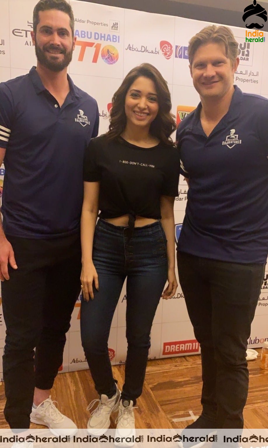 Tamannaah with Shane Watson and Ben Cutting from the promotional event of Deccan Gladiators team