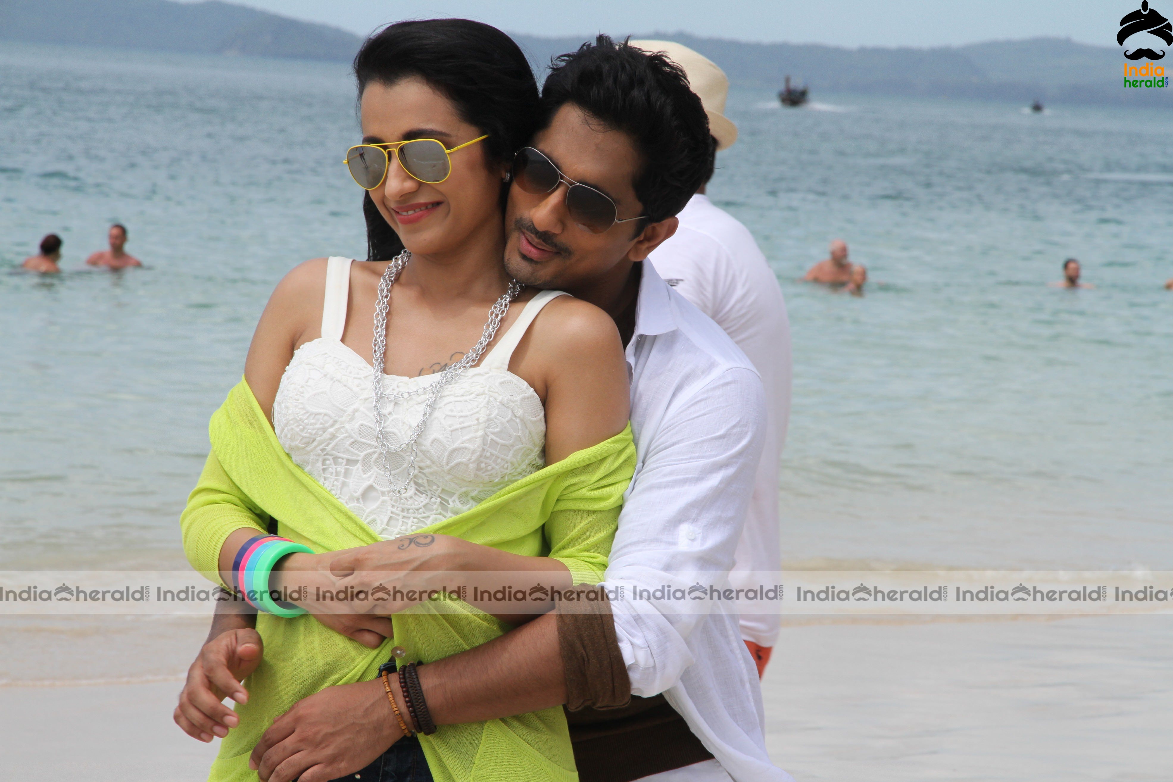 Trisha Hot Hd Pics in Bikini while getting intimate with Sid