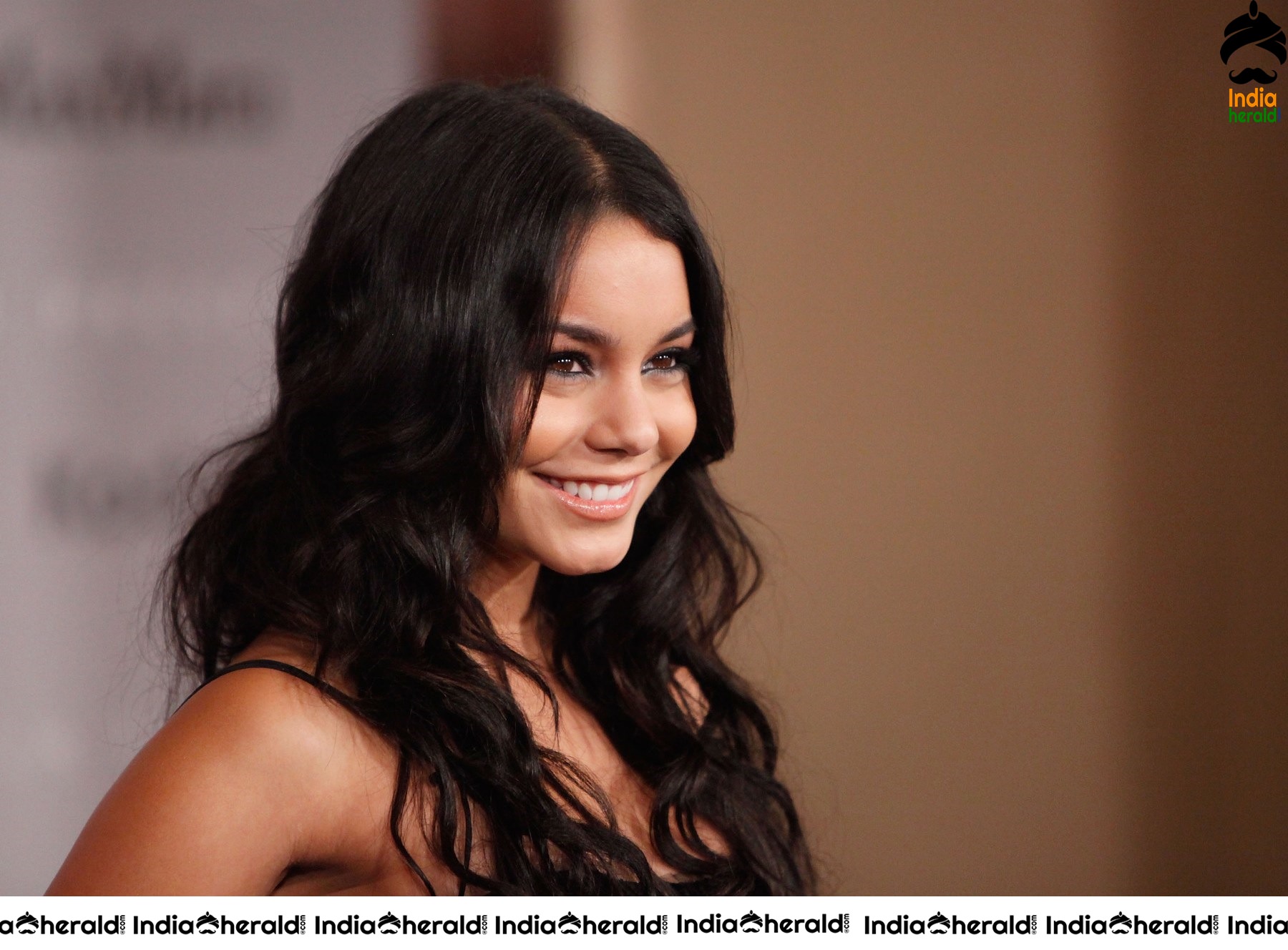 Vanessa Hudgens is all smiles as she receives Women of the Year Award