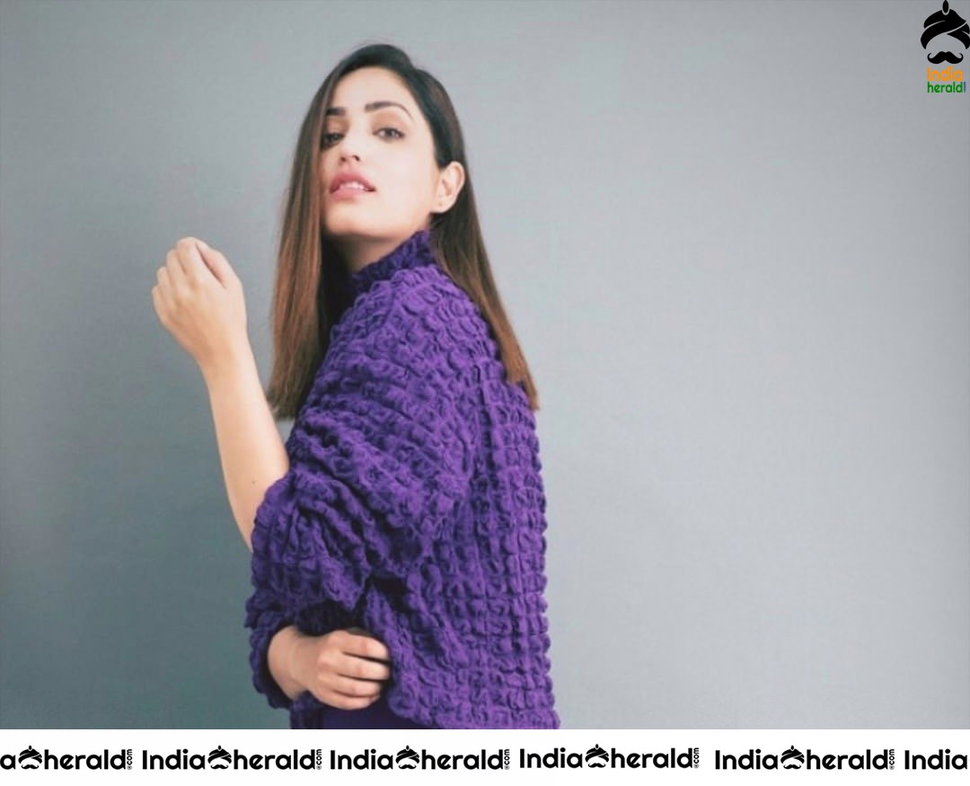 Yami Gautam Latest Photos in Purple Woolen Attire