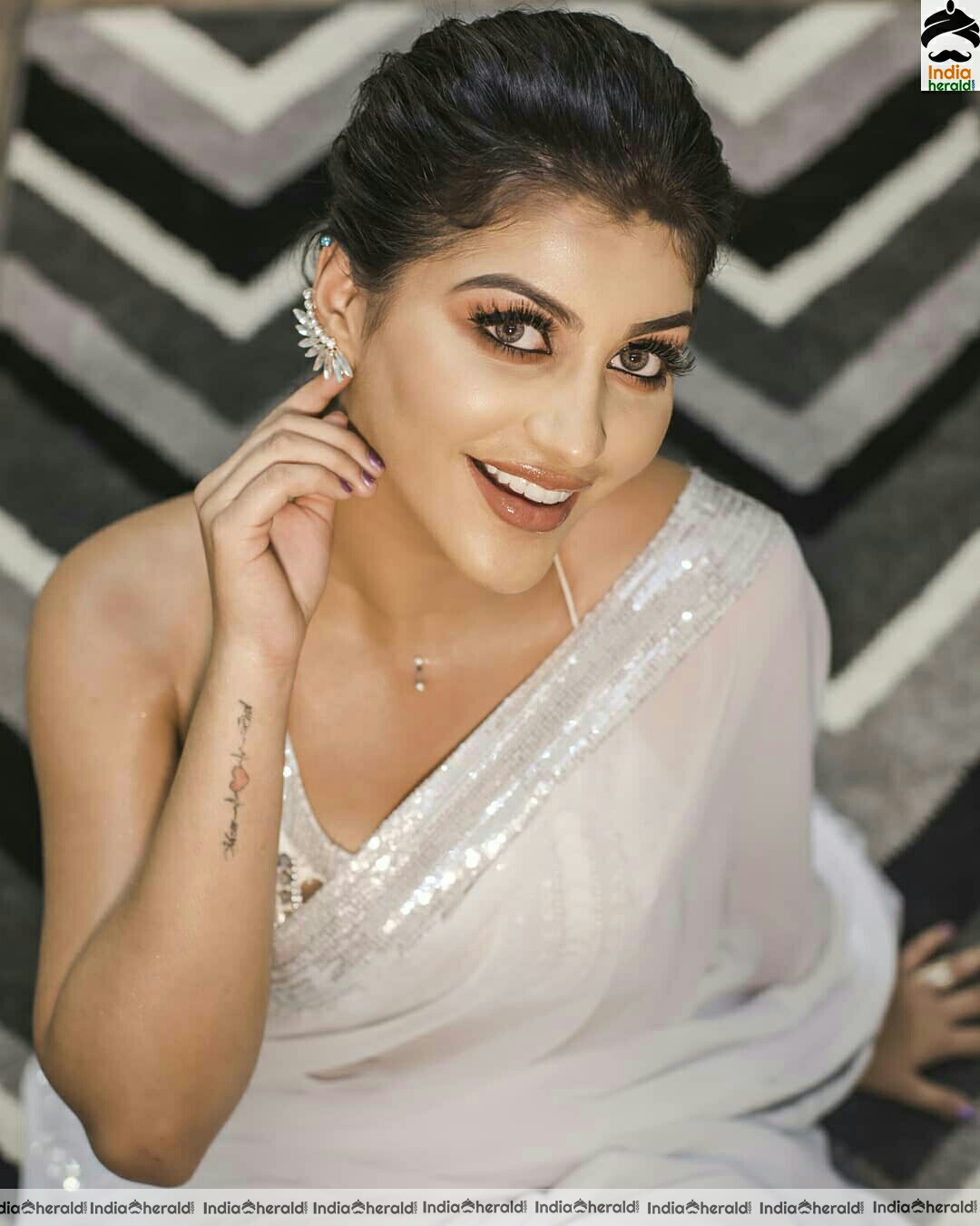 Yashika Aannand Hot And Cute Sleeveless Blouse white Transparent Saree Stills