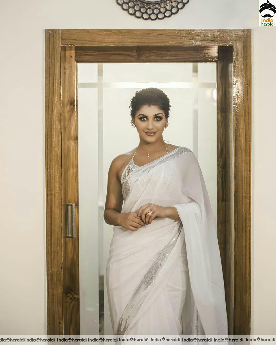Yashika Aannand Hot And Cute Sleeveless Blouse white Transparent Saree Stills
