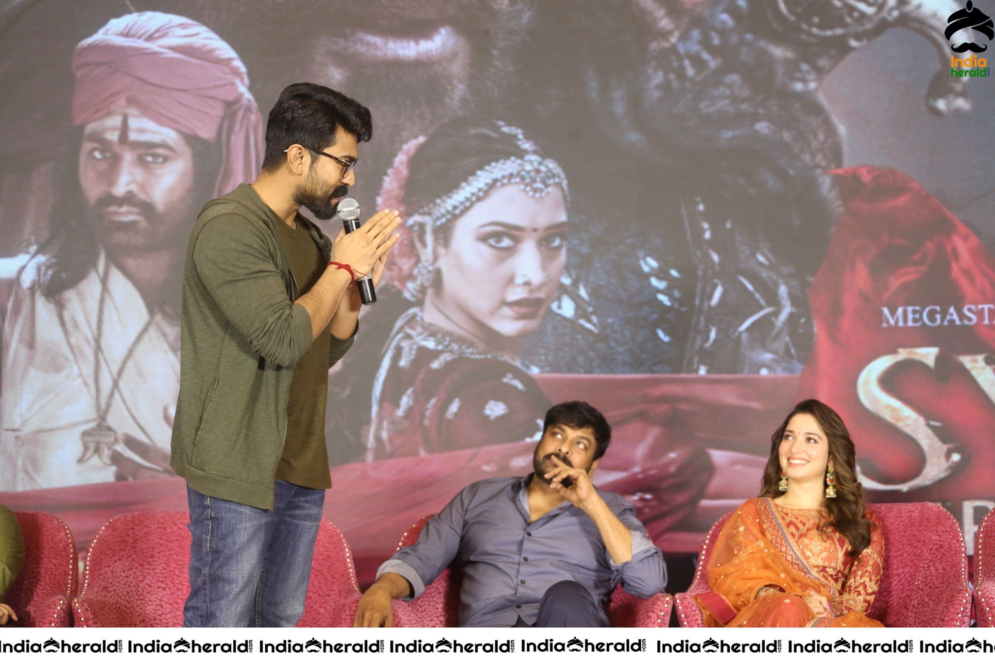 Chiranjeevi Tamanna and Ram Charan from the stage of Sye Raa Thank You Meet Set 1
