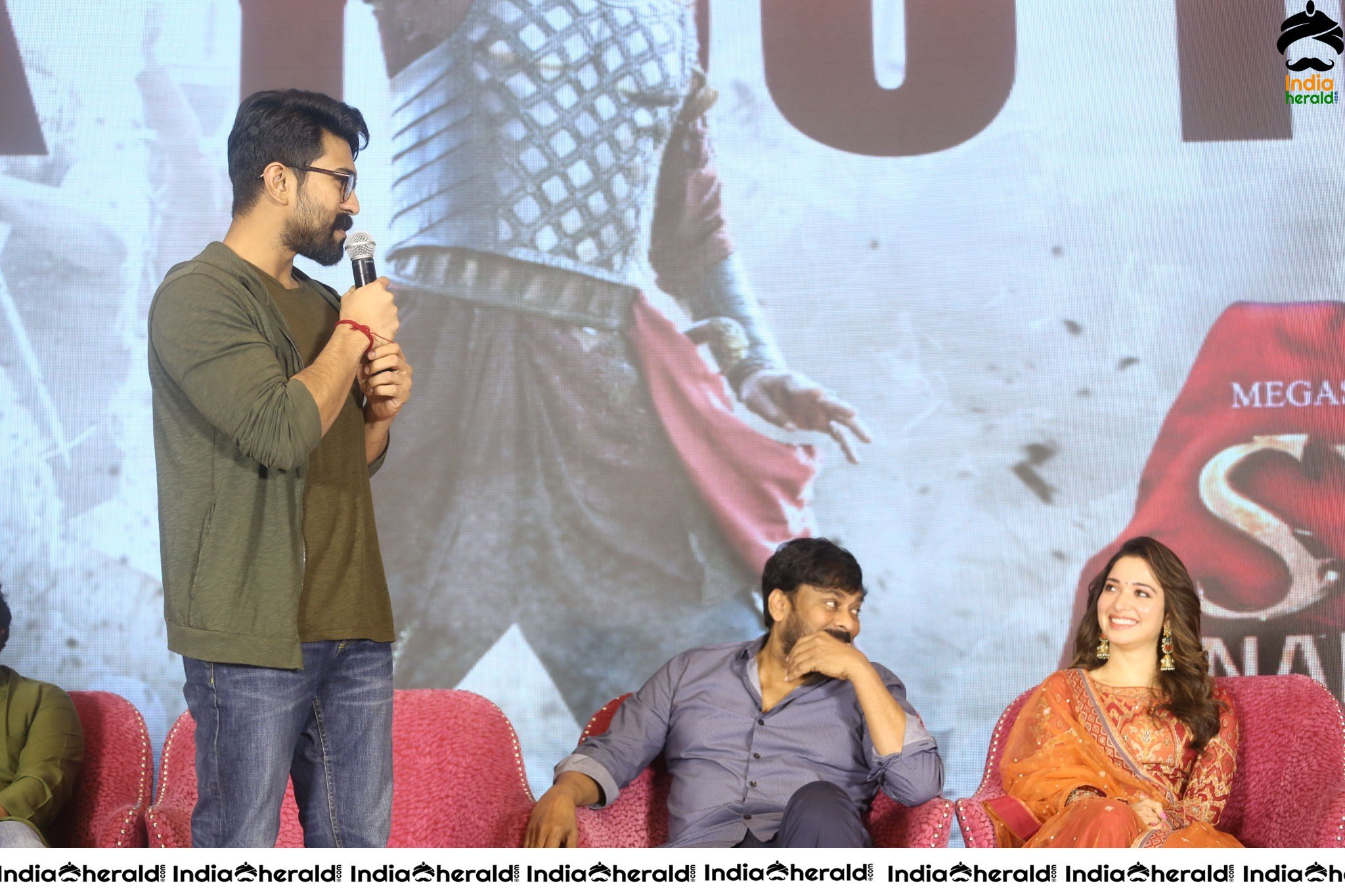 Chiranjeevi Tamanna and Ram Charan from the stage of Sye Raa Thank You Meet Set 1