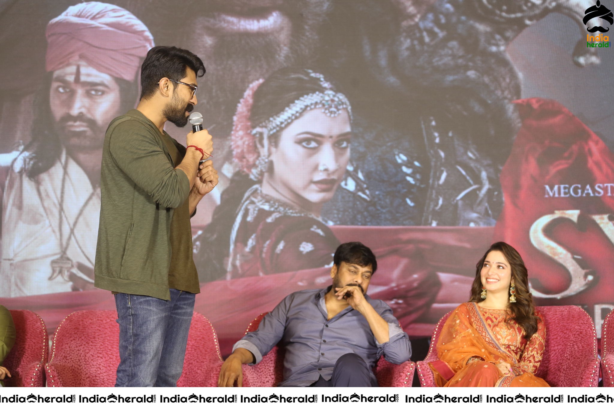 Chiranjeevi Tamanna and Ram Charan from the stage of Sye Raa Thank You Meet Set 1