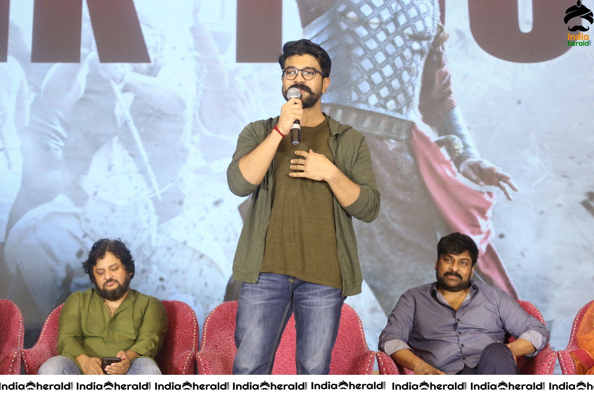 Chiranjeevi Tamanna and Ram Charan from the stage of Sye Raa Thank You Meet Set 1