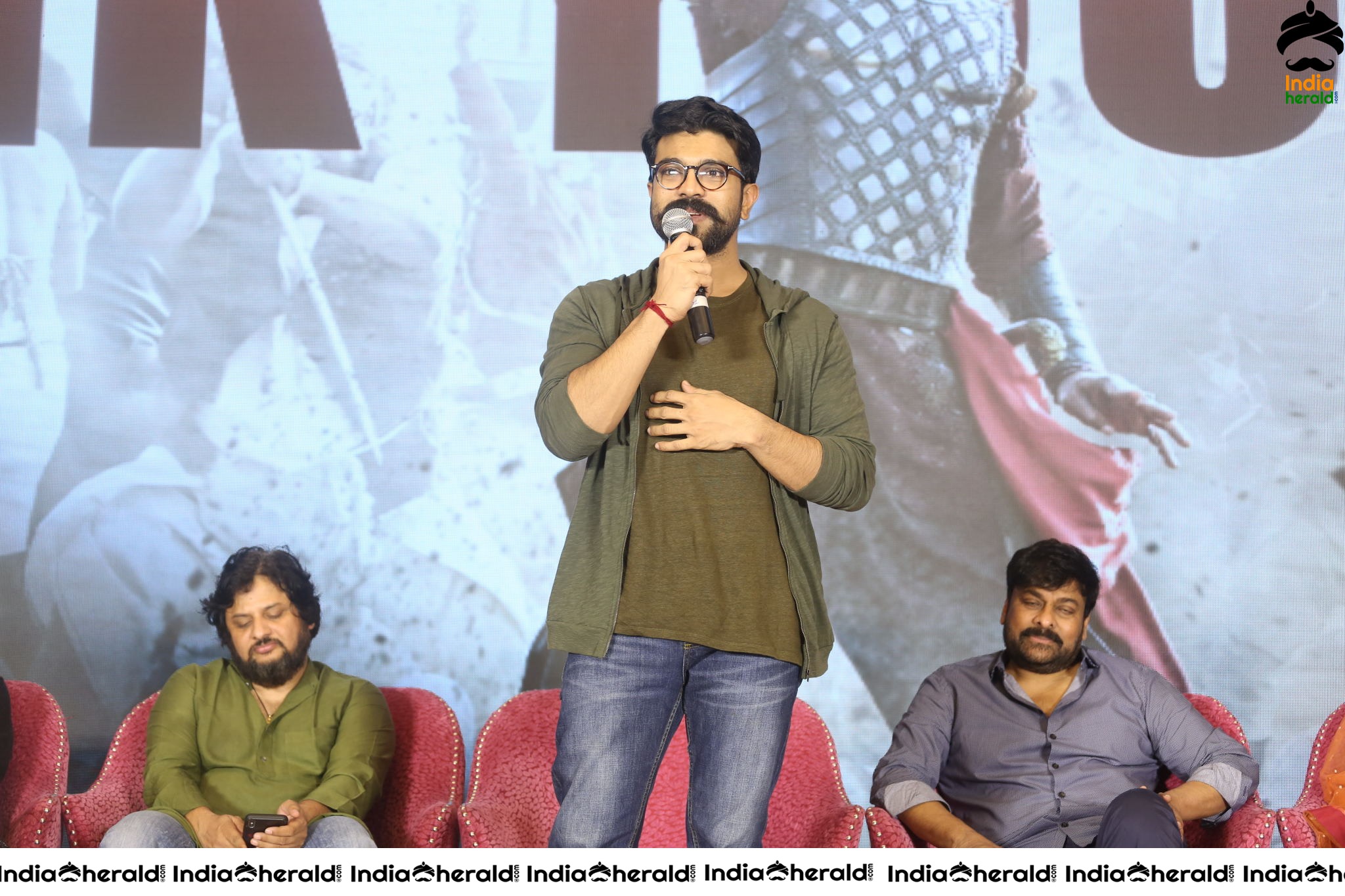 Chiranjeevi Tamanna and Ram Charan from the stage of Sye Raa Thank You Meet Set 1