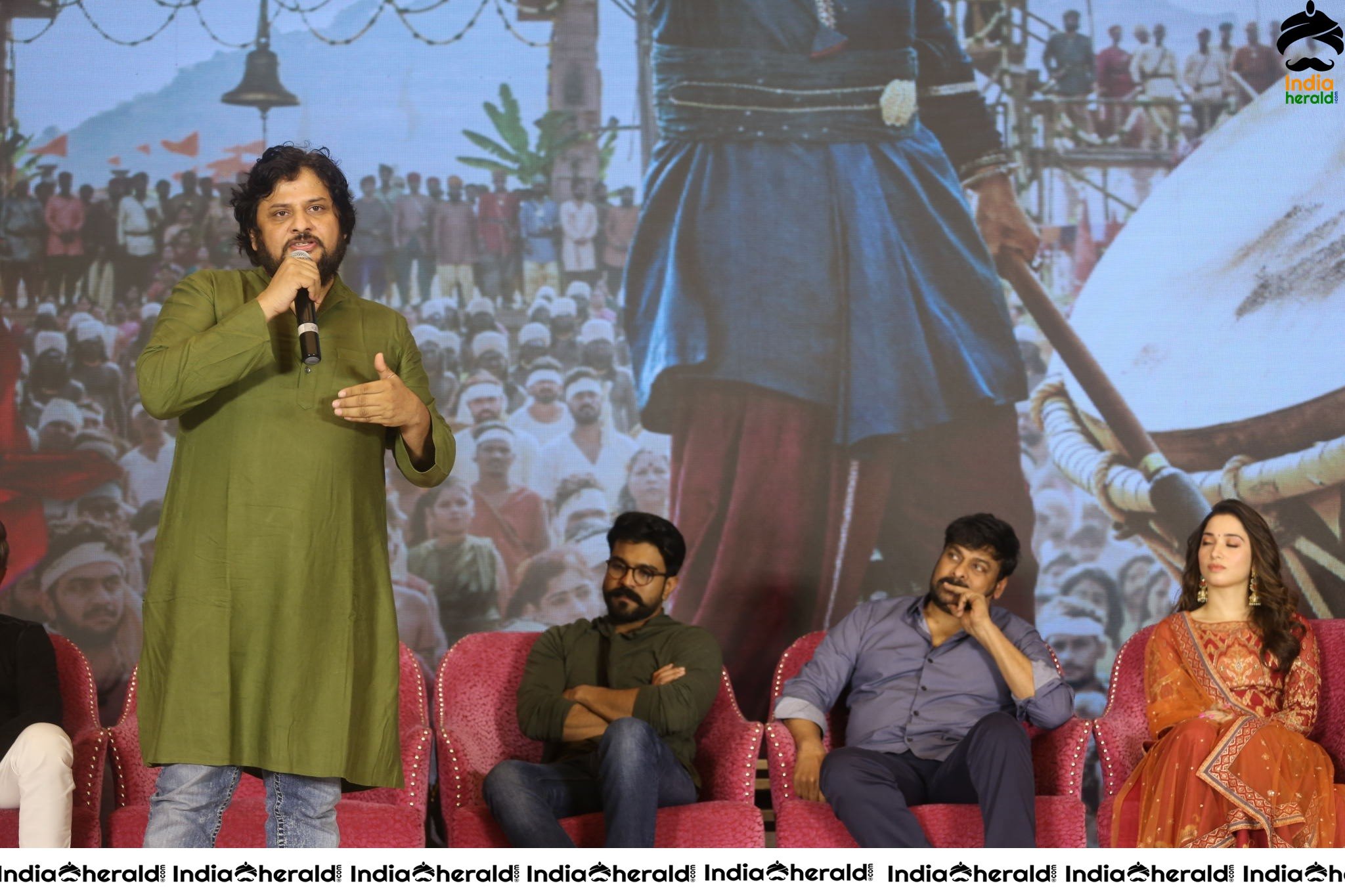 Chiranjeevi Tamanna and Ram Charan from the stage of Sye Raa Thank You Meet Set 1