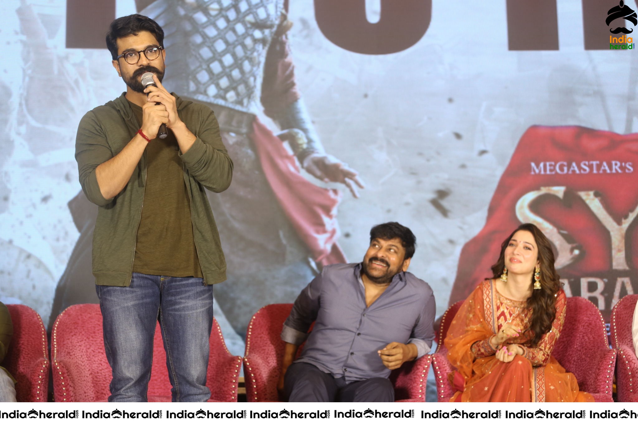 Chiranjeevi Tamanna and Ram Charan from the stage of Sye Raa Thank You Meet Set 2